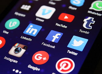 Close-up of smartphone screen with social media app icons