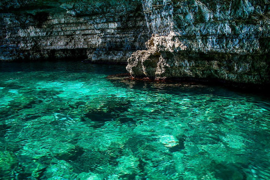 Crystal Clear Turquoise Water in Rocky Sea Cave