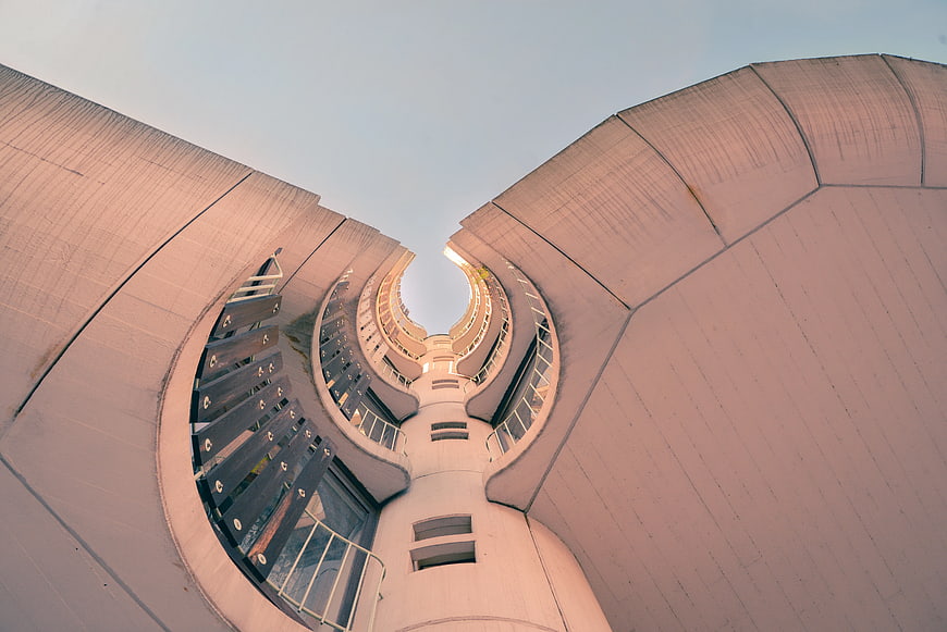 Low angle view of modern curved concrete architecture