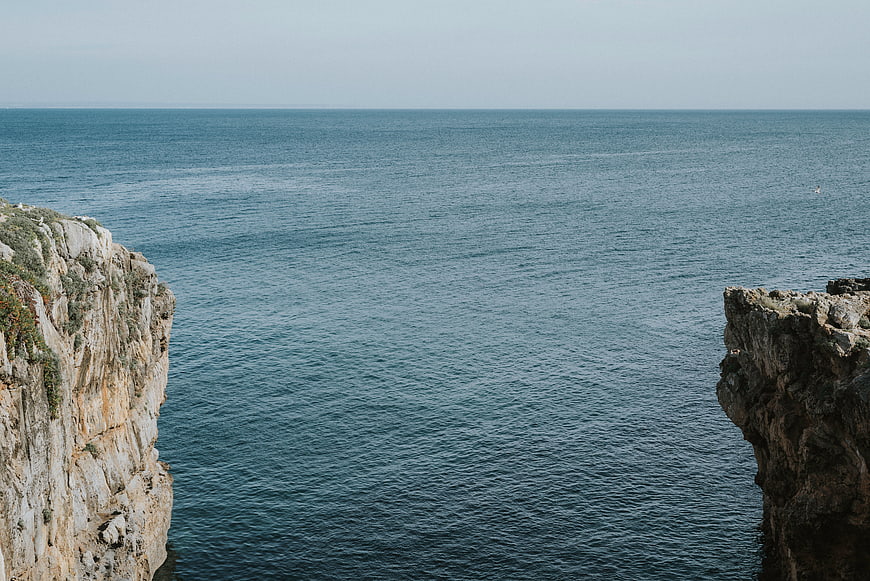 Serene Ocean View Between Rocky Cliffs