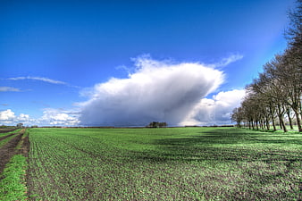 Dramatic Storm Cloud Over Green Agricultural Field