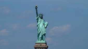 Statue of Liberty against blue sky