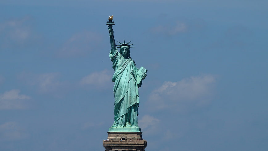 Statue of Liberty against blue sky