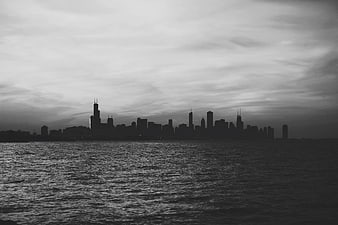 Black and White Chicago Skyline Silhouette Over Lake