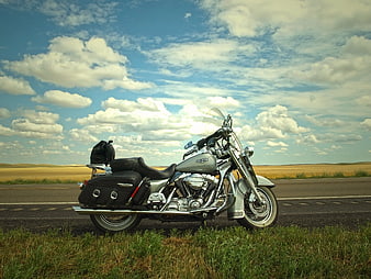 Silver Cruiser Motorcycle Parked on Highway Shoulder