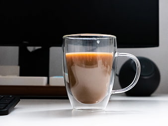Double-Walled Glass Mug of Coffee on Office Desk