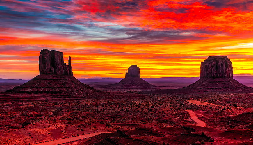 Vibrant Sunset Over Monument Valley Desert Buttes