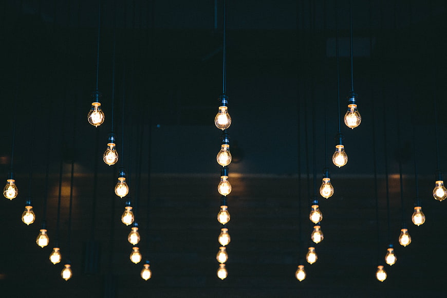 Hanging Edison Light Bulbs in Dark Room