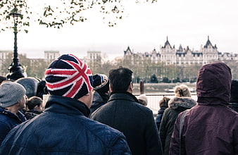 Crowd Watching River View with Union Jack Beanie
