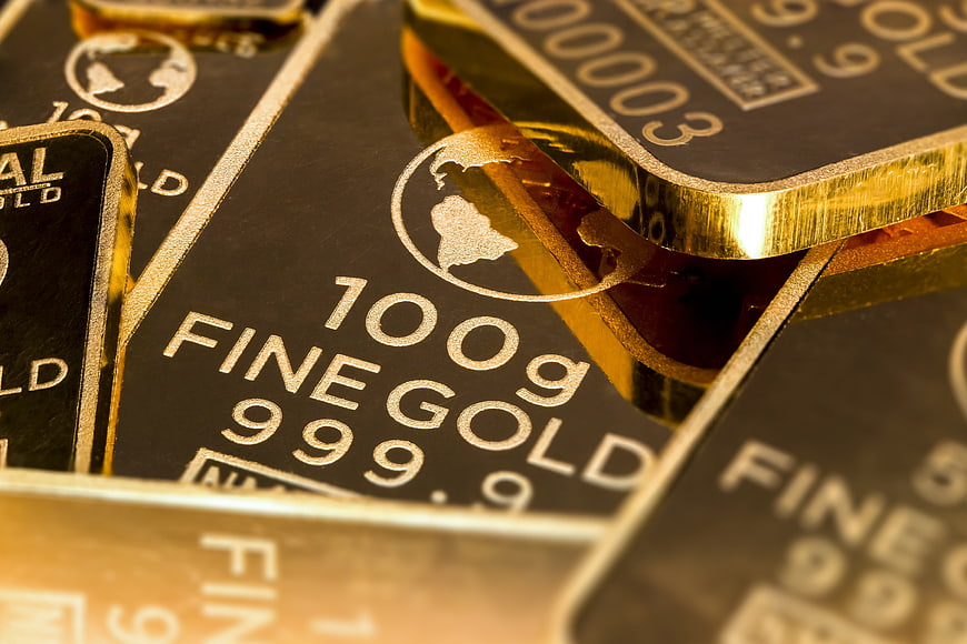 Close-up of 100g Fine Gold Bars with 999.9 Purity Markings