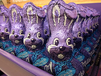 Purple Milka Chocolate Bunnies Displayed in Retail Store
