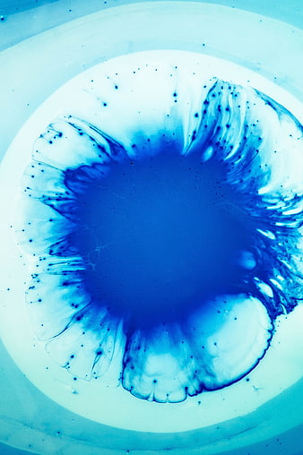 Abstract Blue Ink Swirl in White Liquid