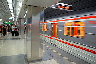 Motion blur subway train arriving at Prague metro station platform