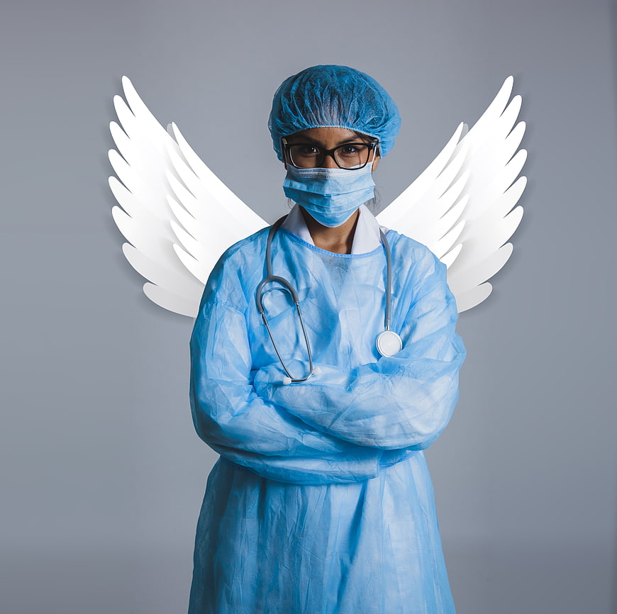 Medical professional with angel wings in blue scrubs