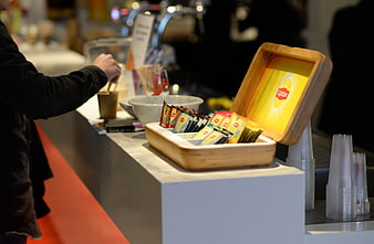 Lipton tea selection at a modern beverage bar counter