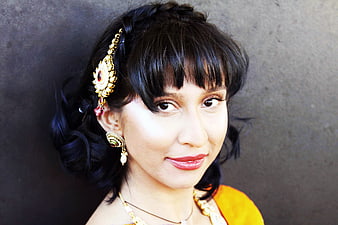 Portrait of Indian Woman with Traditional Jewelry and Bangs