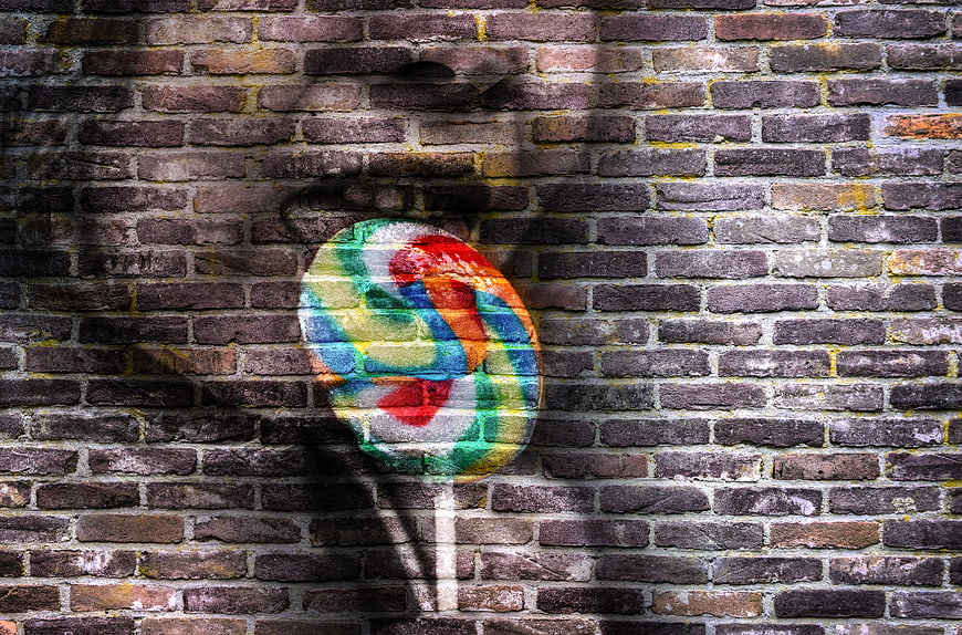 Colorful Lollipop Graffiti on Old Brick Wall