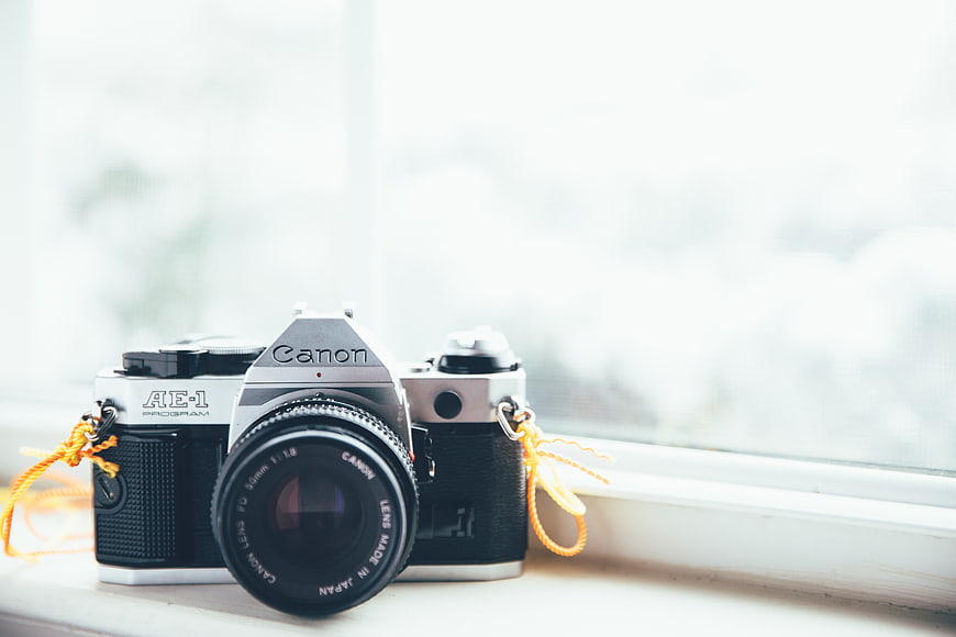 Vintage Canon AE-1 Camera on Window Sill