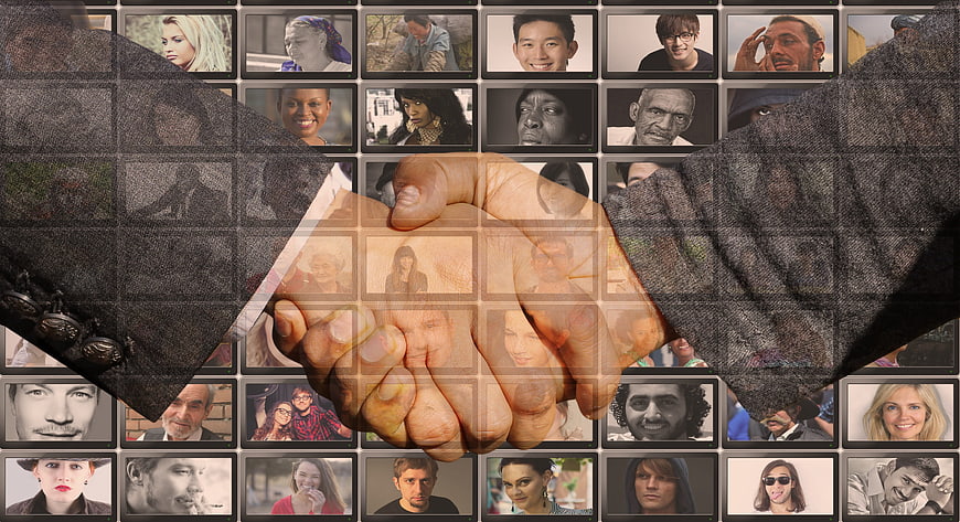 Handshake Over Grid of Diverse Human Portraits