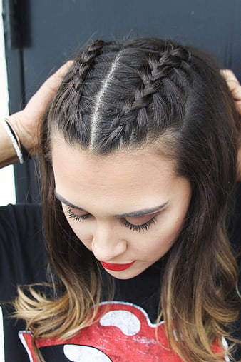 Young Woman with Braided Hairstyle and Red Lipstick