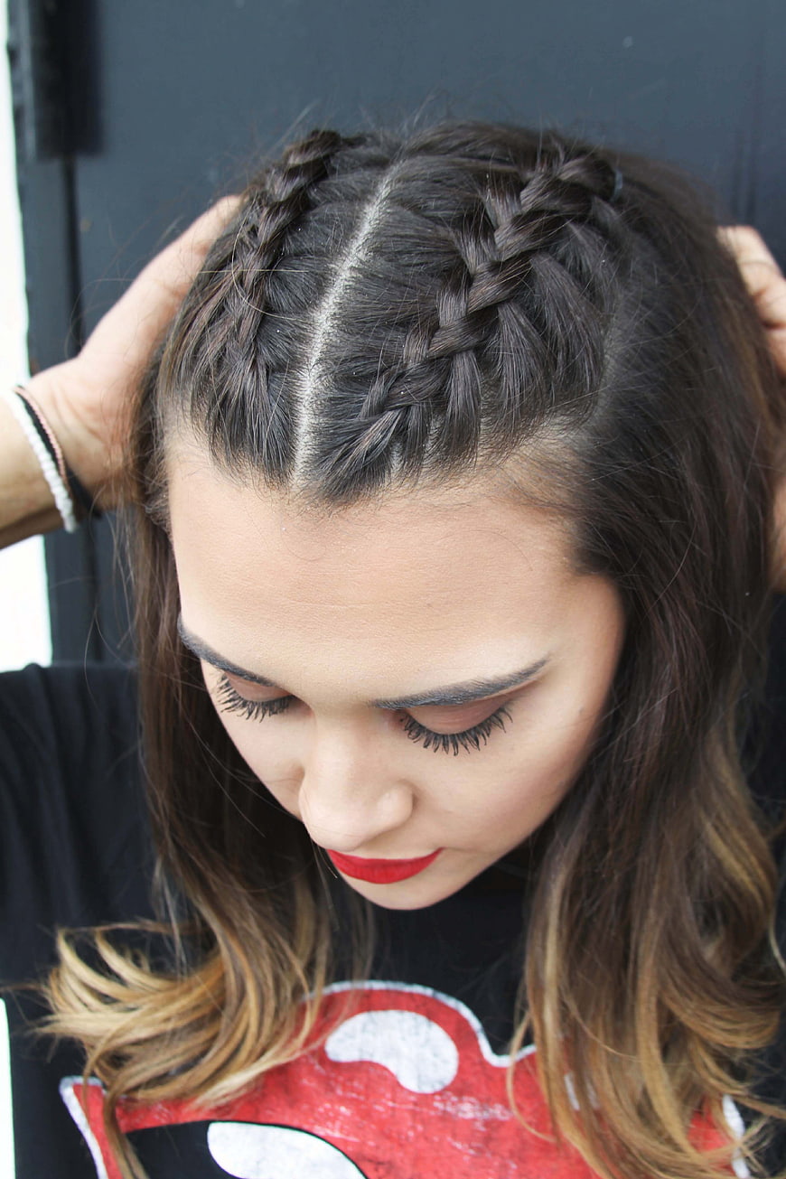 Young Woman with Braided Hairstyle and Red Lipstick