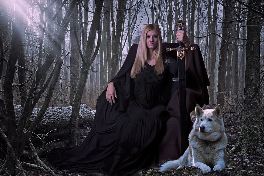 Gothic Fantasy Woman Warrior with Sword and White Wolf in Forest