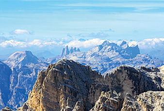 Dramatic Dolomites Mountain Peaks with Clouds