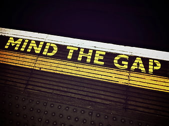 Mind the Gap subway platform warning sign