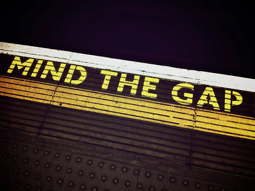 Mind the Gap subway platform warning sign