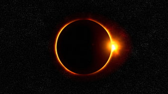 Dramatic solar eclipse with bright diamond ring effect