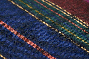 Close-up of colorful striped woven textile fabric texture