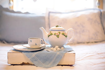 Vintage Tea Set on Bed with Morning Light