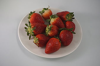 Fresh Red Strawberries on White Plate