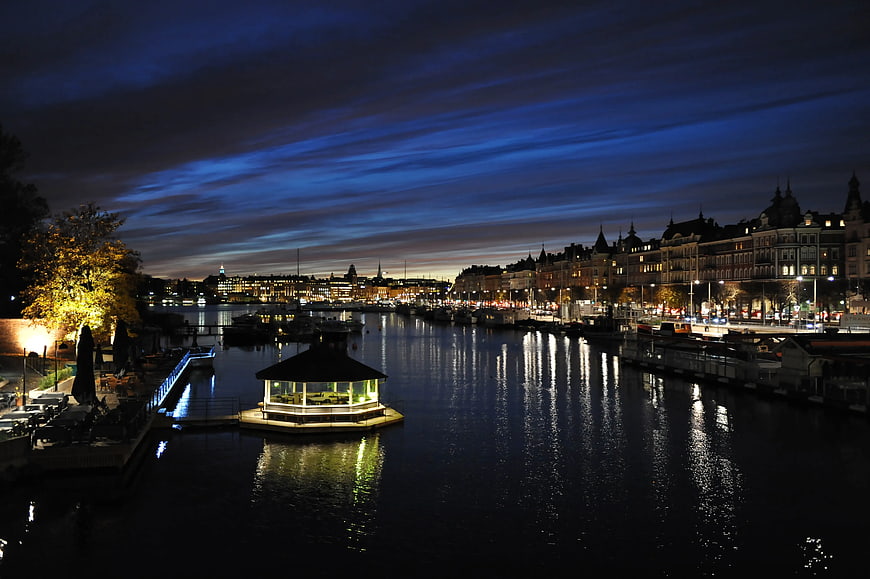 Night View of Floating Restaurant on Harbor Water