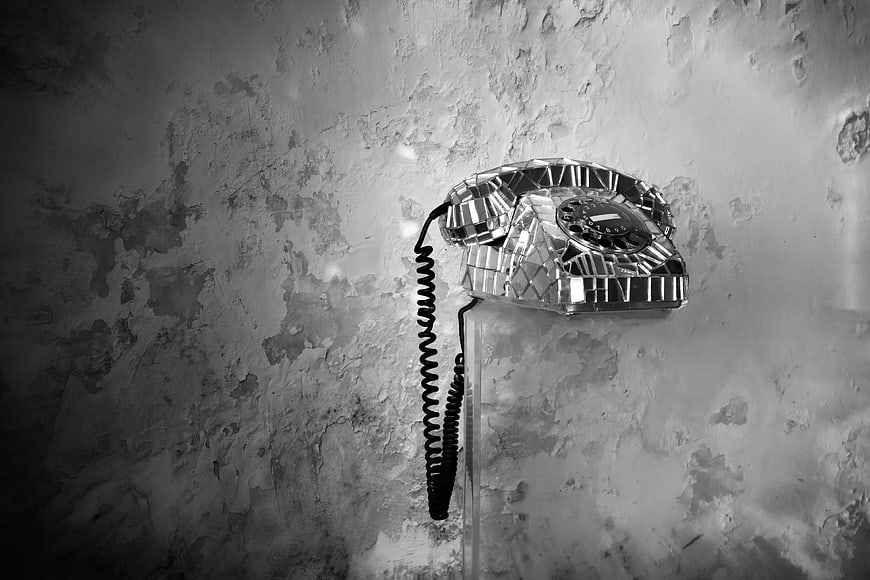 Vintage Mosaic Telephone on Textured Wall