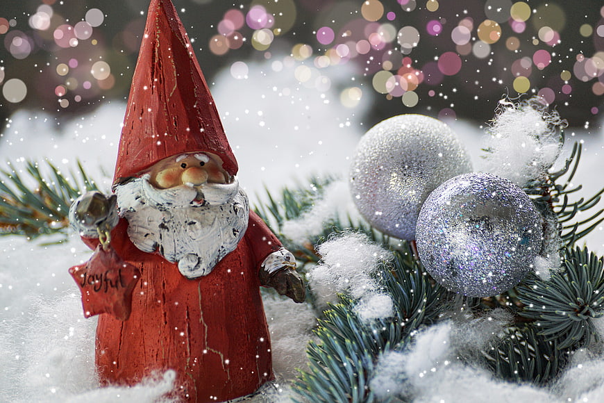 Red Christmas Gnome Figurine with Silver Ornaments in Snow