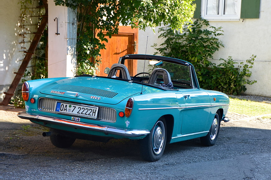 Vintage Teal BMW 700 Convertible Parked Outdoors