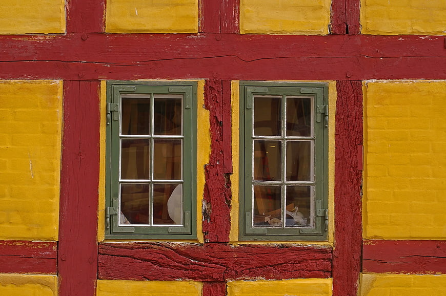 Colorful Half-Timbered House Facade with Green Windows
