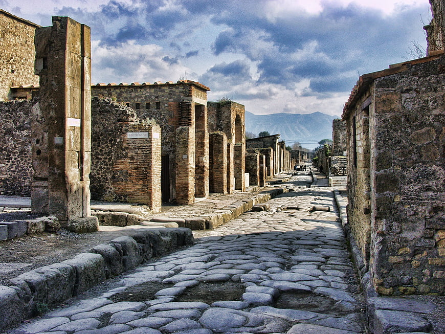 Ancient Roman Street in Pompeii with Cobblestones and Ruins