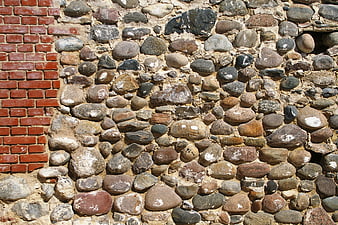 Textured stone and brick wall background