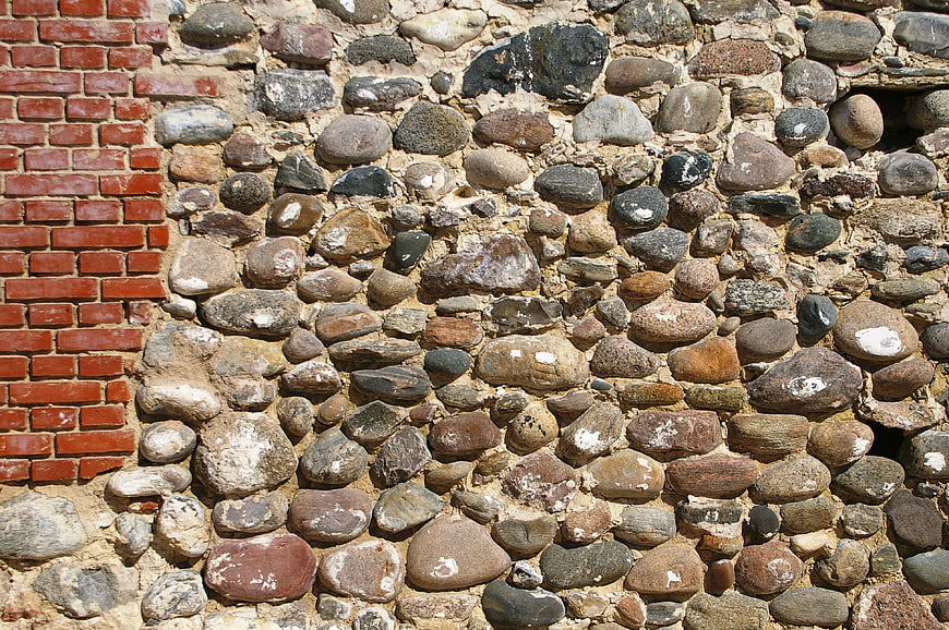 Textured stone and brick wall background