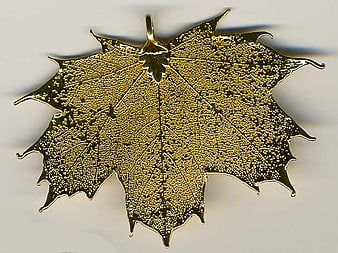Gold-coated maple leaf pendant with intricate skeleton texture