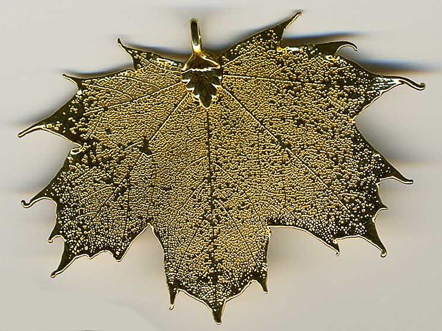 Gold-coated maple leaf pendant with intricate skeleton texture