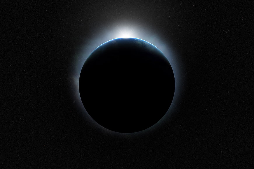 Dramatic Earth Eclipse in Deep Space with Starry Background