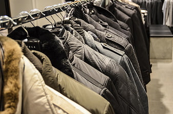 Winter Jackets On Hanger Rack In Clothing Store