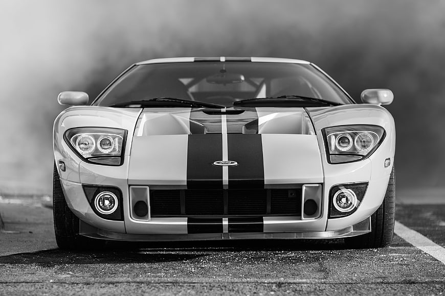 Front view of a Ford GT supercar with racing stripes