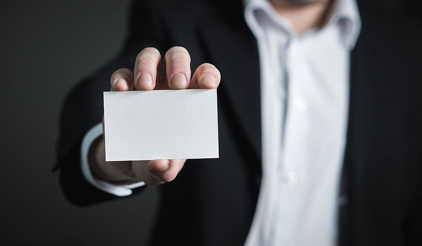Businessman Hand Holding Blank White Business Card