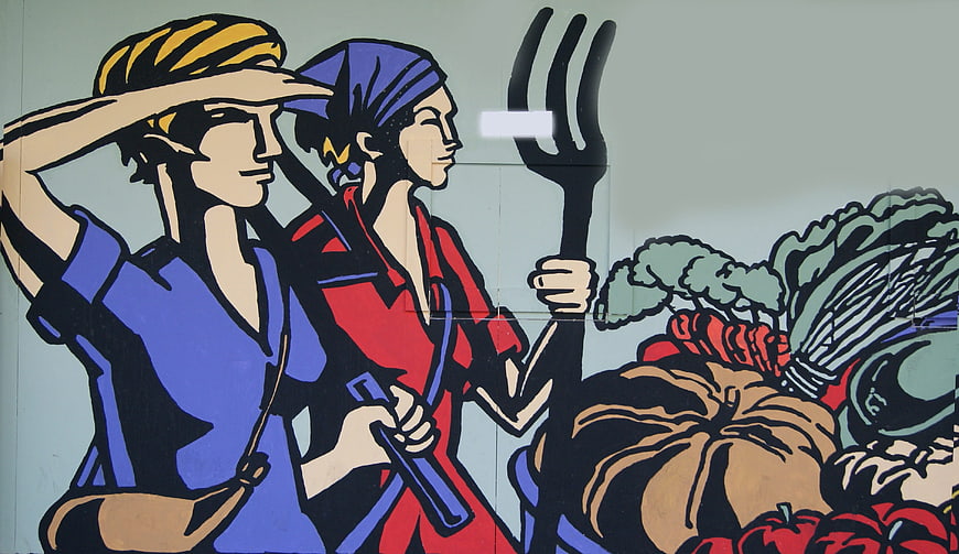 Mural of Two Women Farming with Giant Fork and Vegetables