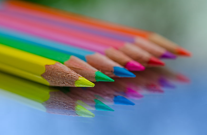 Colorful Pencils on Reflective Surface