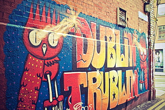 Colorful Dublin Street Art Mural with Owl